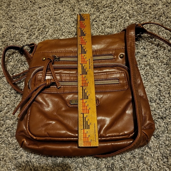 Stone & CO smoking mountain bucket cross body in the color Cognac - Picture 9 of 14